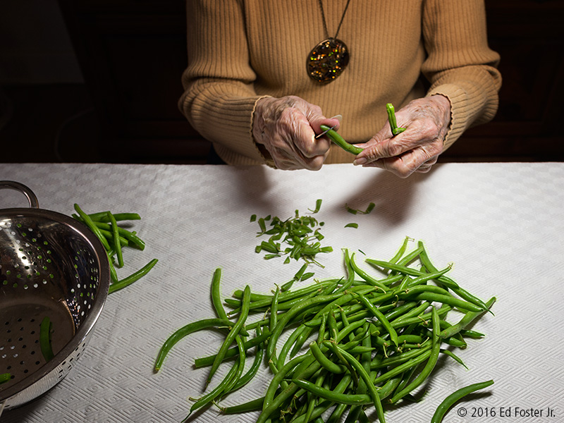 This photograph of my mother-in-law snapping green beans on her 88th birthday, provides for a vignette photograph that speaks to her enjoyment of cooking. 