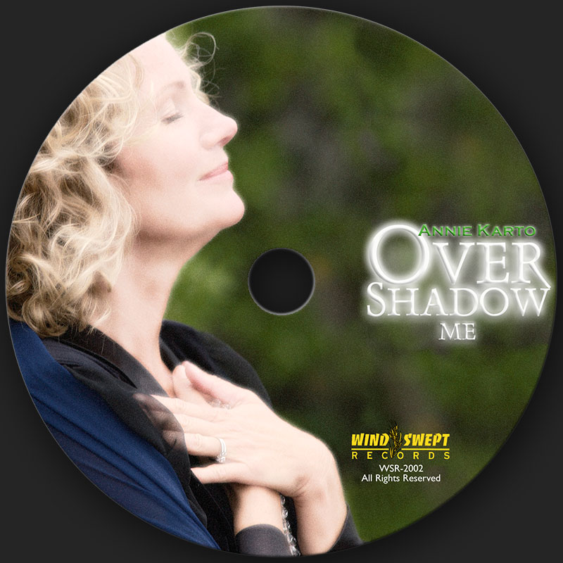 Compact Disk design for Overshadow Me by Catholic singer and songwriter, Annie Karto. This work received a Unity Award for Album Packaging of the Year by United Catholic Music & Video Artists (UCMVA), as well as a Unity Award for Album of the Year for Annie Karto.